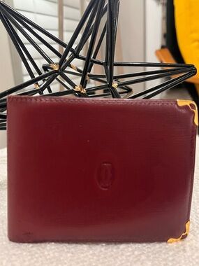 Cartier Burgundy Leather Bi-Fold Wallet with Gold Corner Accents